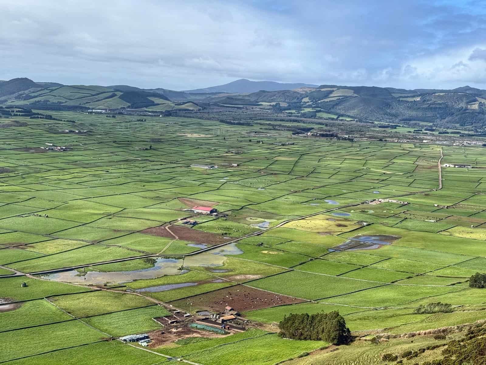 Miradouro da Serra do Cume with green checkerboard agricultural landscape on Terceira in the Azores, Portugal
