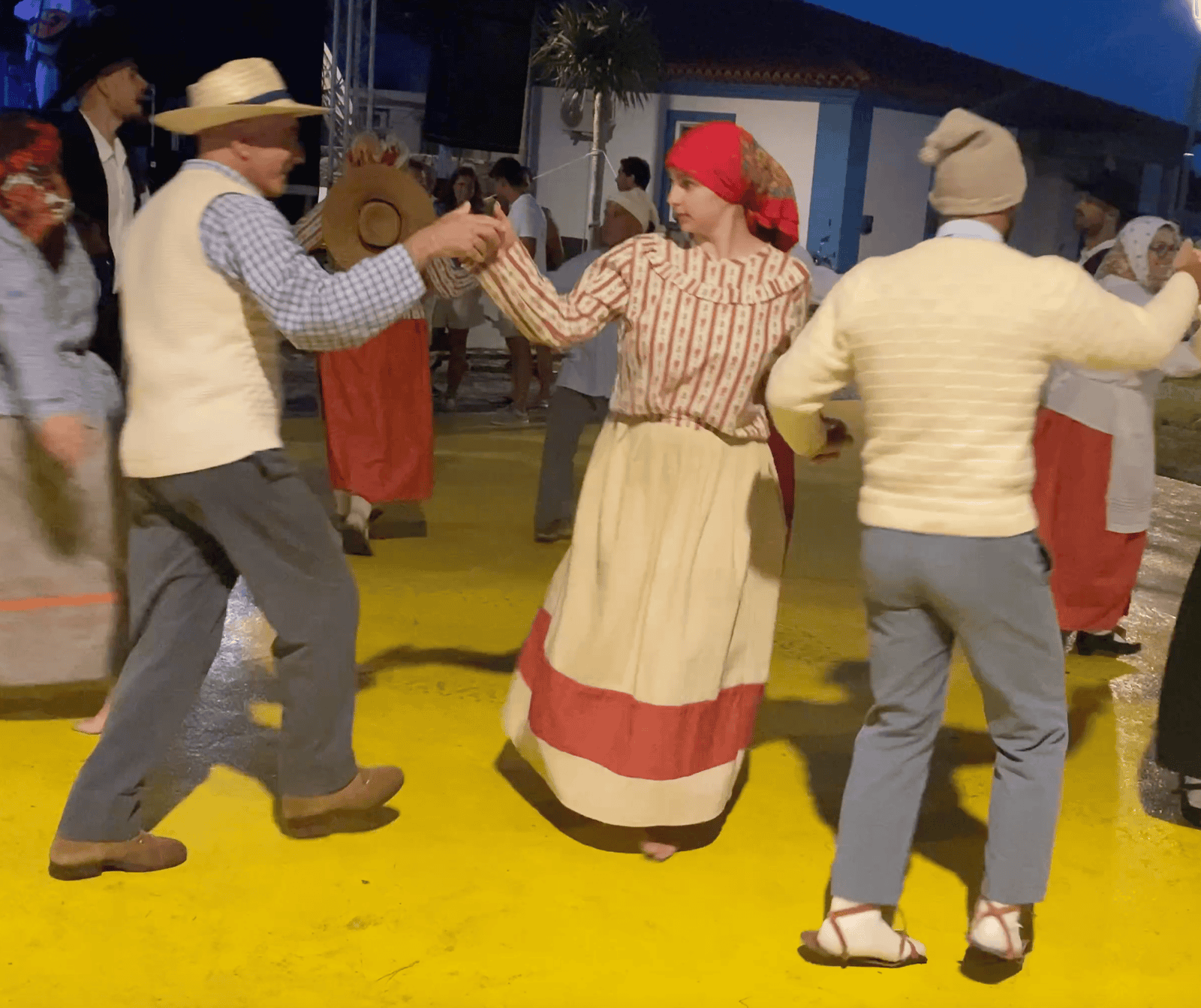 Traditional Azores folk dance with dancers in colorful costumes on Corvo in the Azores, Portugal