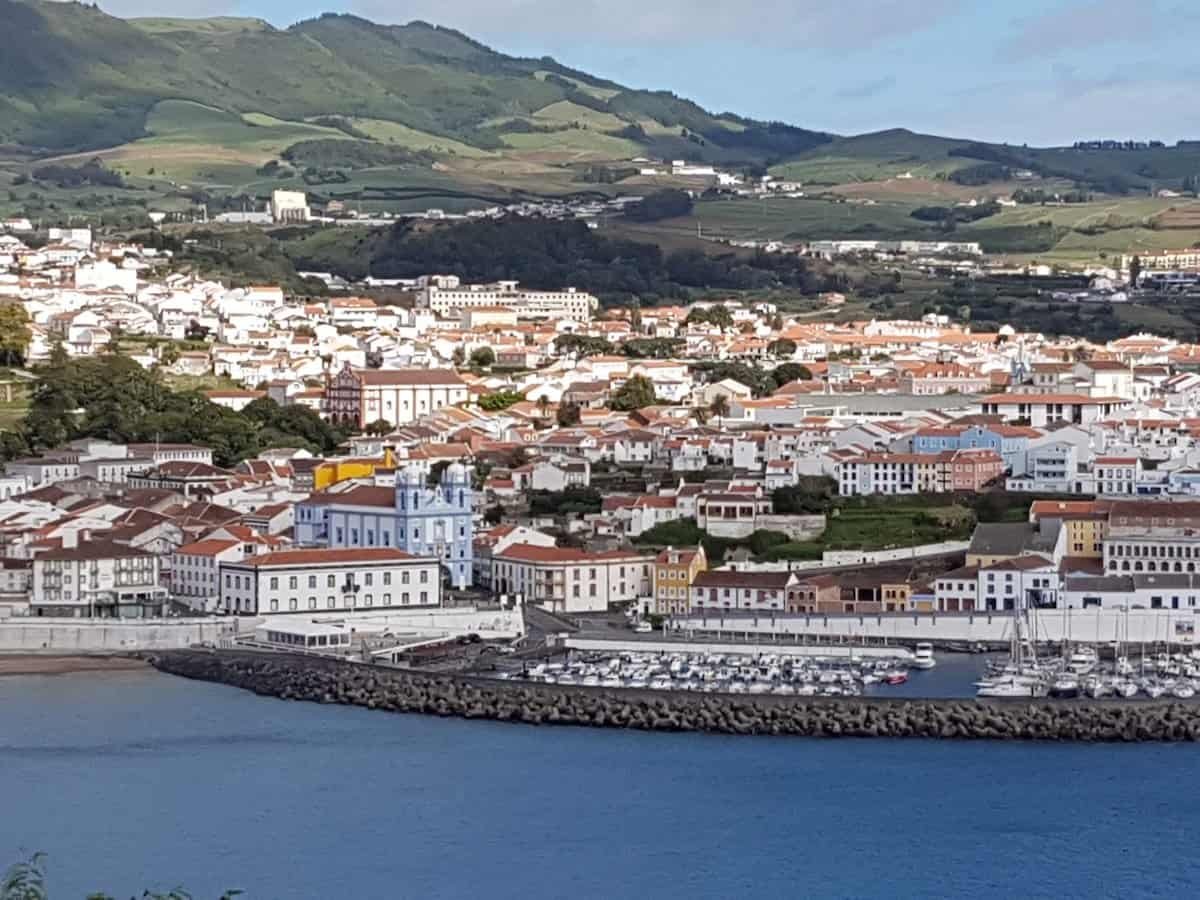 Historic city of Angra do Heroismo on Terceira in the Azores, with colorful buildings set on a hillside